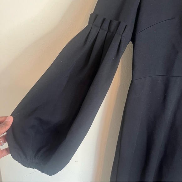 𝅺Tibi Stuctured Minimalist Ponte Knit Bishop Sleeve
Dress - Picture 3 of 11